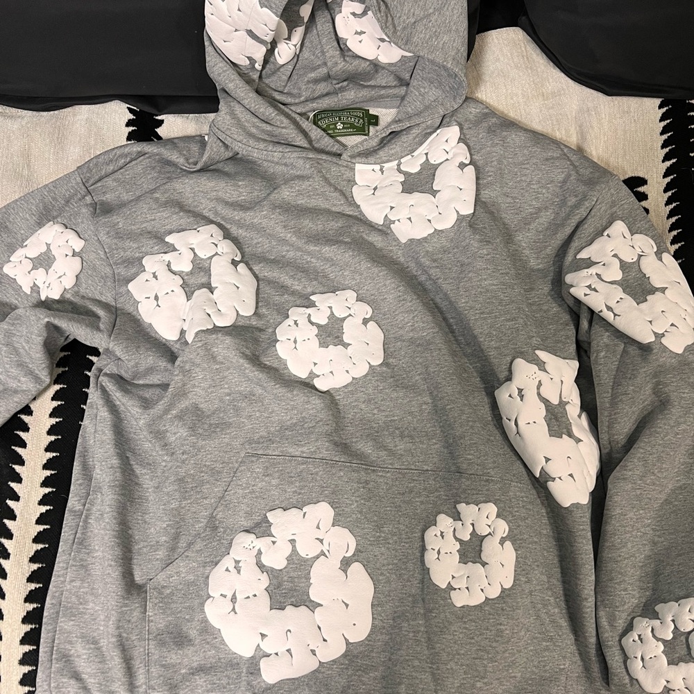 Denim Tears Cotton Wreath Hoodie with a puff print design